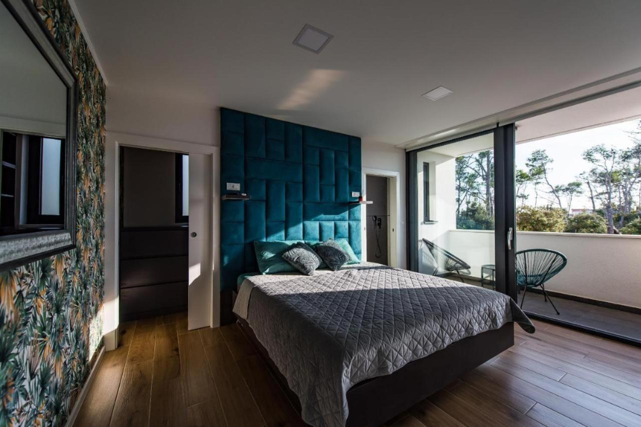 Lisa By Belmont Realty *